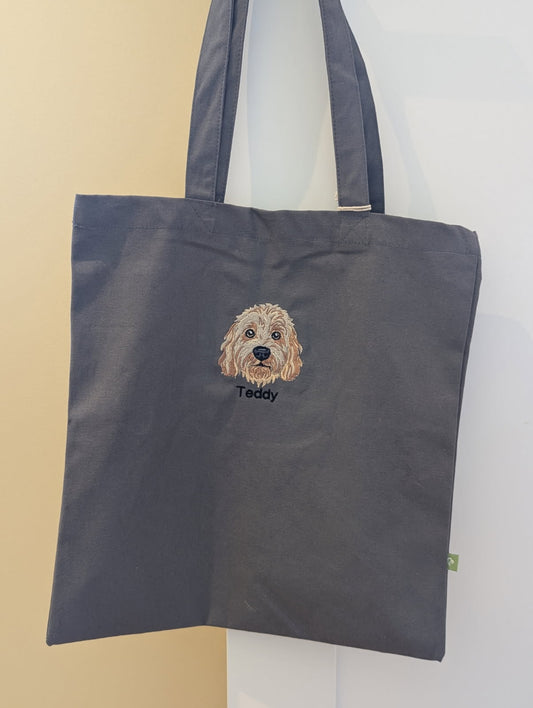 Broderi av egen hund fra fotografi cobberdog